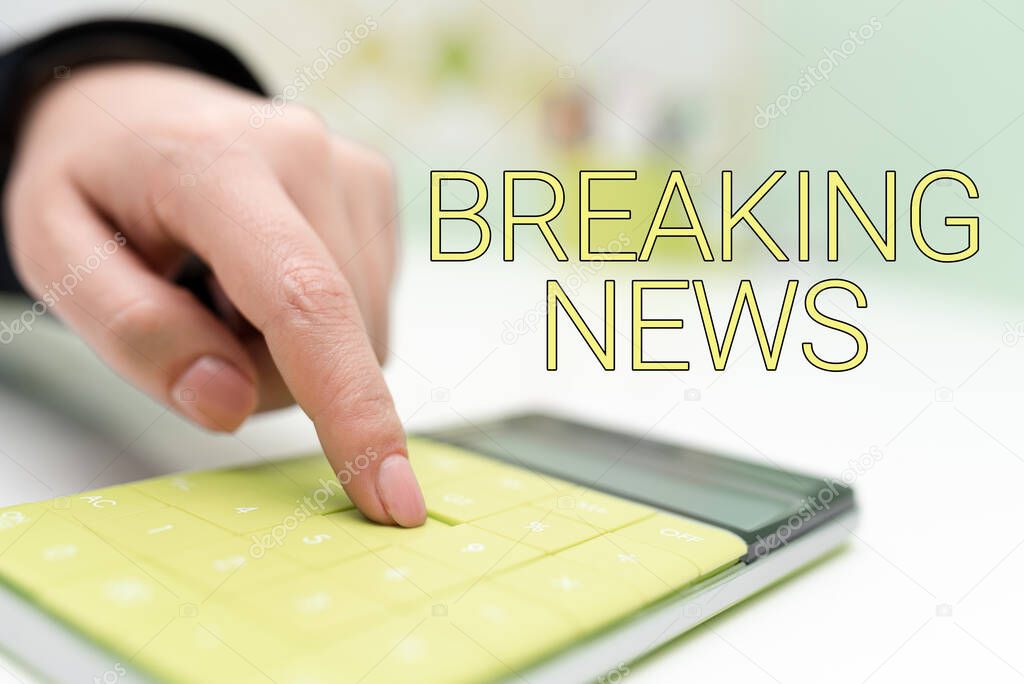 Conceptual display Breaking News, Business idea Special Report Announcement Happening Current Issue Flashnews Businesswoman Pointing On Calculator On Desk With Notebook.