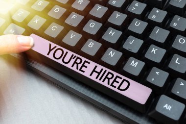 Writing displaying text You Re Are Hired, Concept meaning New Job Employed Newbie Enlisted Accepted Recruited -49132