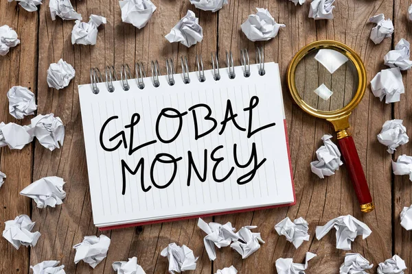 Conceptual caption Global Money, Business approach International finance World currency Transacted globally Note With Important Data Written In With Paper Wraps And Magnifier Around.