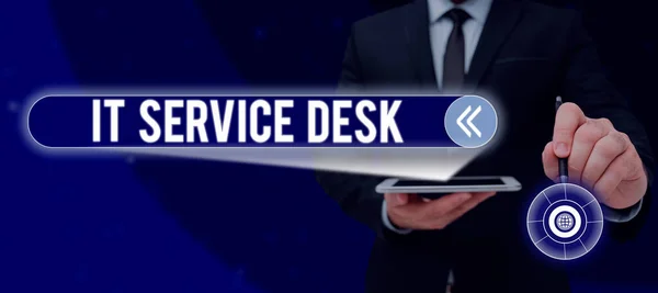 Text sign showing It Service Desk, Business approach Technological support online assistance help center Business Person Holding Pen And Teblet Presenting Important Business Ideas