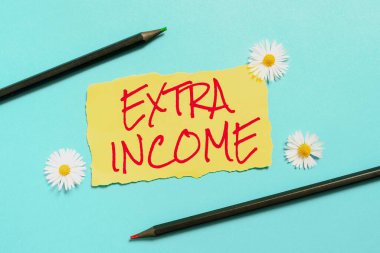 Inspiration showing sign Extra Income, Word Written on Additional fund received or earned from a non regular basis Ripper Piece Of Paper With New Ideas With Flowers And Pencils Around.