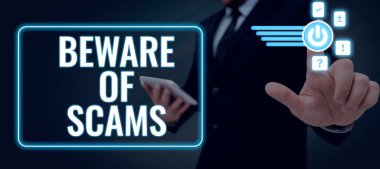 Writing displaying text Beware Of Scams, Business idea Stay alert to avoid fraud caution be always safe security Lady in suit holding pen symbolizing successful teamwork accomplishments.