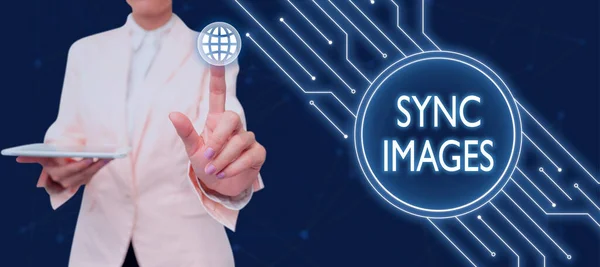Writing displaying text Sync Images, Concept meaning Making photos identical in all devices Accessible anywhere Businessman in suit holding open palm symbolizing successful teamwork.
