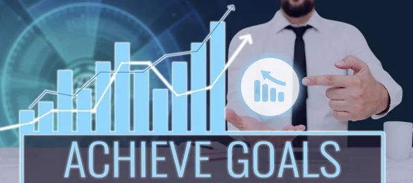 Inspiration showing sign Achieve Goals, Business overview Results oriented Reach Target Effective Planning Succeed Businessman Pointing On A Chart Showing Crucial Diagrams And Data.