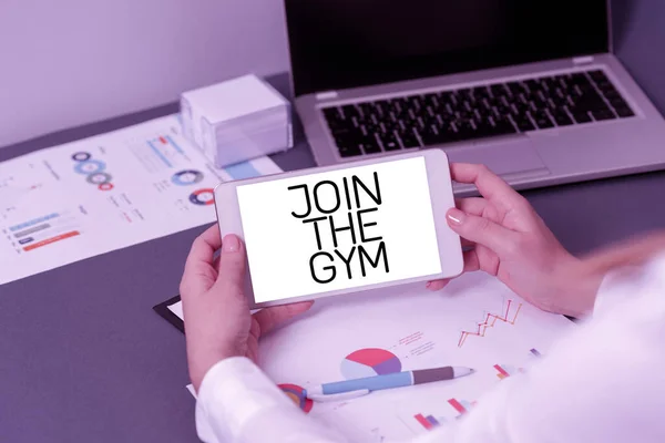 Conceptual caption Join The Gym, Word for Motivation to start working out making exercises fitness Businesswoman Holding Tablet With Important Informations On It.