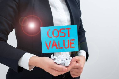 Inspiration showing sign Cost Value, Internet Concept The amount that usualy paid for a item you buy or hiring a person Businesswoman Holding Paper Wraps And Important Message On Stick.
