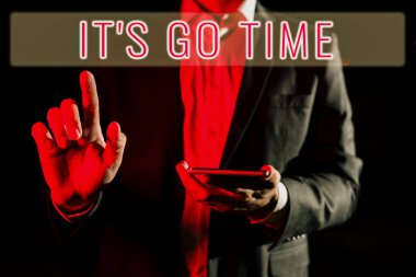Text sign showing It S Is Go Time, Word for A period to undertake the assigned tasks Bring it ON Man Holding Tablet And Pointing With One Finger On Important Message