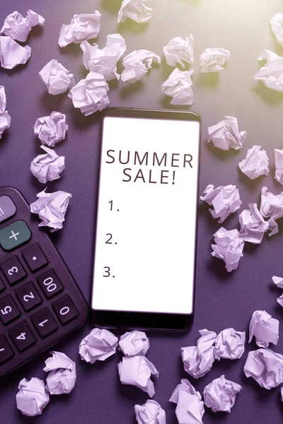 Conceptual caption Summer Sale, Business showcase Annual discount events that takes place during summer season Phone Screen With New Idea On It Surrounded With Paper Wraps And Calculator