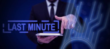 Text caption presenting Last Minute, Internet Concept done or occurring at the latest possible time before event Businessman in suit holding open palm symbolizing successful teamwork.