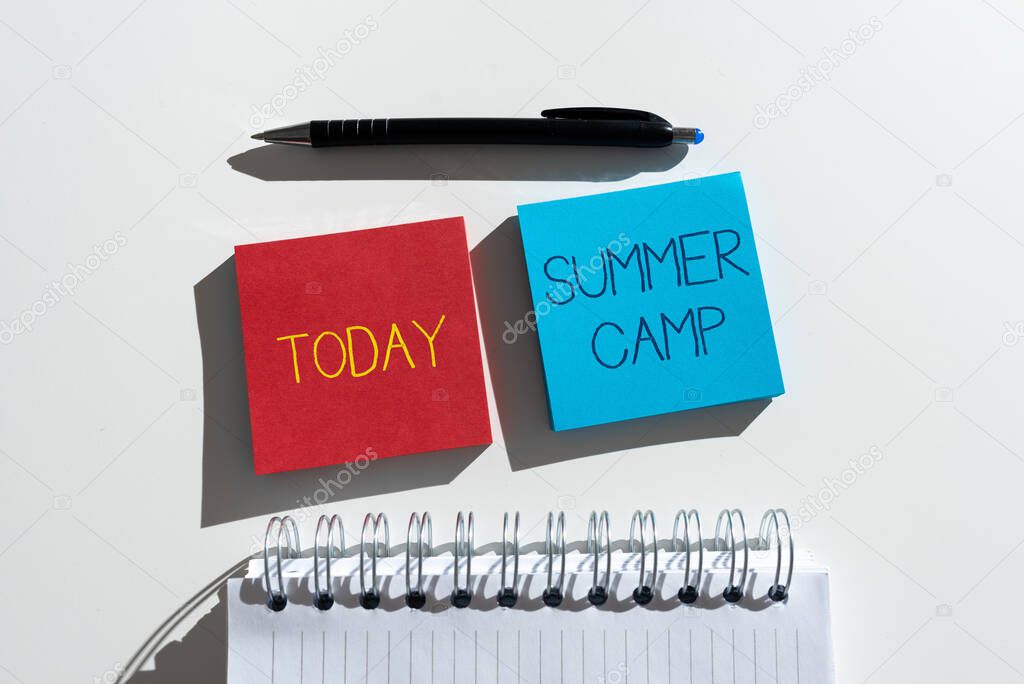 Writing displaying text Summer Camp, Word for Supervised program for kids and teenagers during summertime. Important Messages Written On Two Notes On Desk With Pen And Notebook.