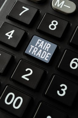 Writing displaying text Fair Trade, Concept meaning Small increase by a manufacturer what they paid to a producer -48738