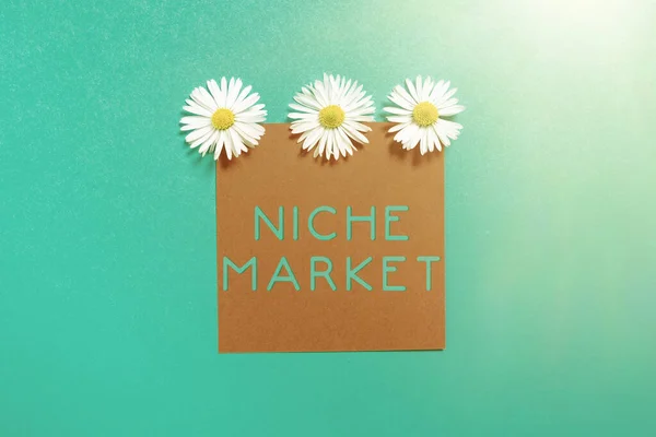 Writing displaying text Niche Market, Business concept Subset of the market on which specific product is focused Sticky Note With Important Messages With Three Flowers Above.