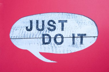 Handwriting text Just Do It, Word for Motivation for starting doing something Have discipline Cropped Speech Bubble With Important Message Placed On Floor.