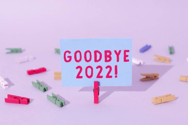 Conceptual display Goodbye 2022, Conceptual photo New Year Eve Milestone Last Month Celebration Transition Important Message Presented On Piece Of Paper Clipped With Clip.