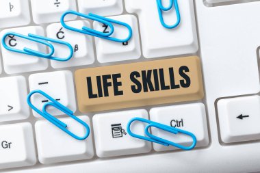 Writing displaying text Life Skills, Word for that is necessary or desirable full participation in everyday -48557