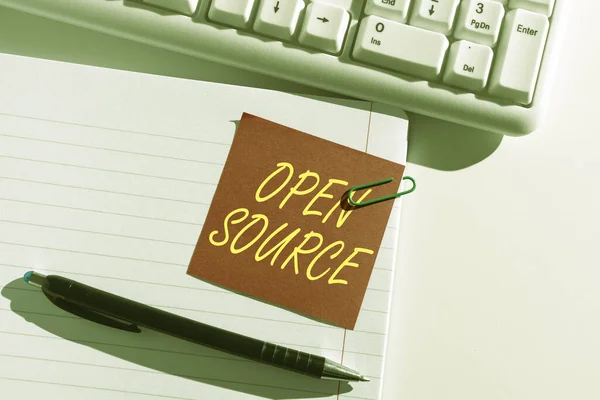 Sign displaying Open Source, Word Written on denoting software which original source code freely available Sticky Note With Important Idea Clipped On Opened Notebook On Desk With Pen