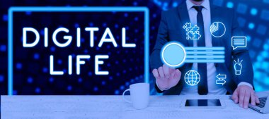 Hand writing sign Digital Life, Internet Concept Living in a world interconnected through Internet Multimedia Man With Laptop And Tablet Pointing On Power Button And Digital S.