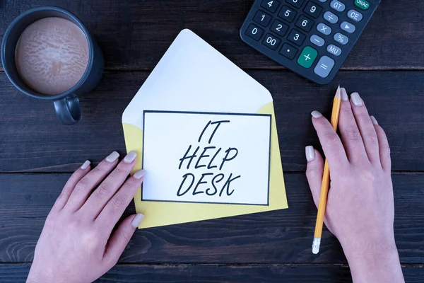 Writing displaying text It Help Desk, Business concept Online support assistance helping showing with technology Woman With Blank Letter, Coffee And Stationery Over Wooden Table.