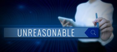Text sign showing Unreasonable, Internet Concept Beyond the limits of acceptability or fairness Inappropriate Businessman in suit holding open palm symbolizing successful teamwork.