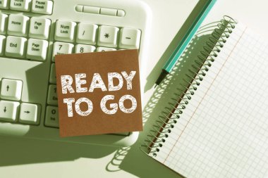 Inspiration showing sign Ready To Go, Internet Concept Are you prepared for the future travel trip mission start Important Messages Written On Note On Desk With Pen, Notebook And Keyboard.