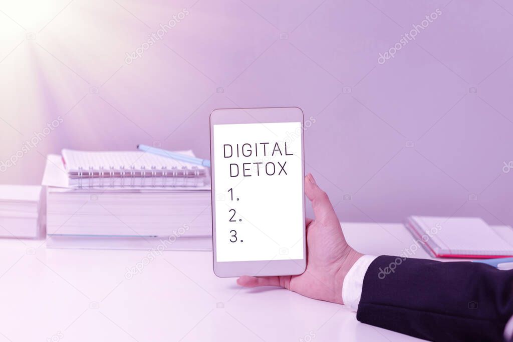 Handwriting text Digital Detox, Word for Free of Electronic Devices Disconnect to Reconnect Unplugged Sitting Businesswoman Holding Mobile Phone With Important Messages.