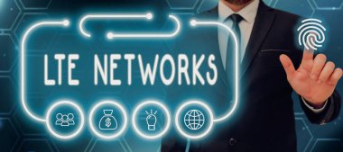 Text sign showing Lte Networks, Business approach Fastest network connection available for wireless communication Businessman Pointing On Fingerprint And Other Digital Signs And Data.
