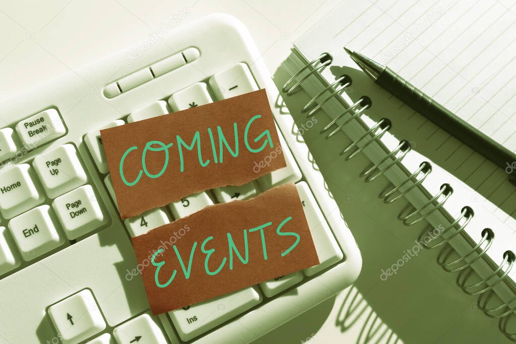Sign displaying Coming Events, Word for Happening soon Forthcoming Planned meet Upcoming In the Future Ripped Note With Important Messages Over Keyboard On Desk With Notebooks.