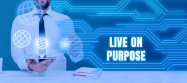 Conceptual caption Live On Purpose, Business approach Have a goal mission motivation to keep going inspiration Businessman Holding Tablet And Presenting Crutial Messages In Office.