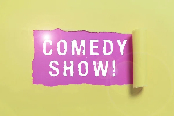 Text showing inspiration Comedy Show, Business showcase Funny program Humorous Amusing medium of Entertainment Important Information Written Underneath Ripped Piece Of Paper.