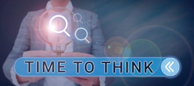 Hand writing sign Time To Think, Business overview Reconsider some things Reflection time Moment to ponder Woman Holding A Light Bulb Displaying Digital Information And Ideas.