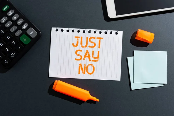 Handwriting text Just Say No, Conceptual photo Do not be afraid of giving negative answers to some things Late News Written On Paper On Desk With Marker,Notes, Tablet And Calculator