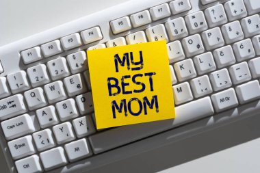 Conceptual caption My Best Mom, Internet Concept Admire have affection good feelings love to your mother Important Informations Written On Note On Desk Above Keyboard.