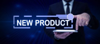 Writing displaying text New Product, Word for goods and services that differ in their characteristics Businessman in suit holding notepad symbolizing successful teamwork.