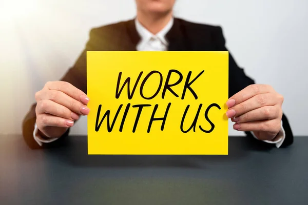 Sign displaying Work With Us, Concept meaning Invitation to join a working team company institution Businesswoman Holding Note With Important Message On Office Desk.