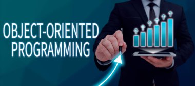 El yazısı işareti Nesne yönelimli programlama, İş Dili model nesneleri, Kattaki Önemli İletilerin Yanında Konuşan Baloncuklar yerine.