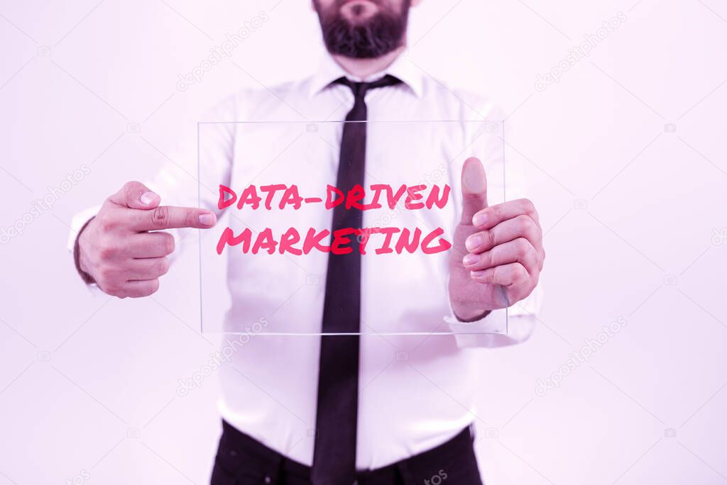Sign displaying Data Driven Marketing, Business idea Strategy built on Insights Analysis from interactions Woman Showing Smartphone With Copy Space Presenting For Branding.