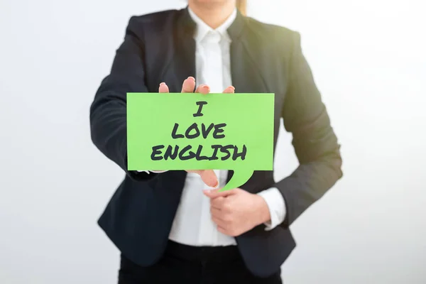 Text showing inspiration I Love English, Word Written on To have affection for international language Grammar Lady in suit holding pen symbolizing successful teamwork accomplishments.