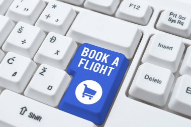 Sign displaying Book A Flight, Internet Concept Purchase tickets to make a trip by plane Planning vacations Paper Wraps Placed Under Cardboard With Important Information.