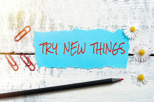 Handwriting text Try New Things, Word for Do different activities get to know other ways of doing Woman Holding Note With Important News And Pointing On It With Pen.