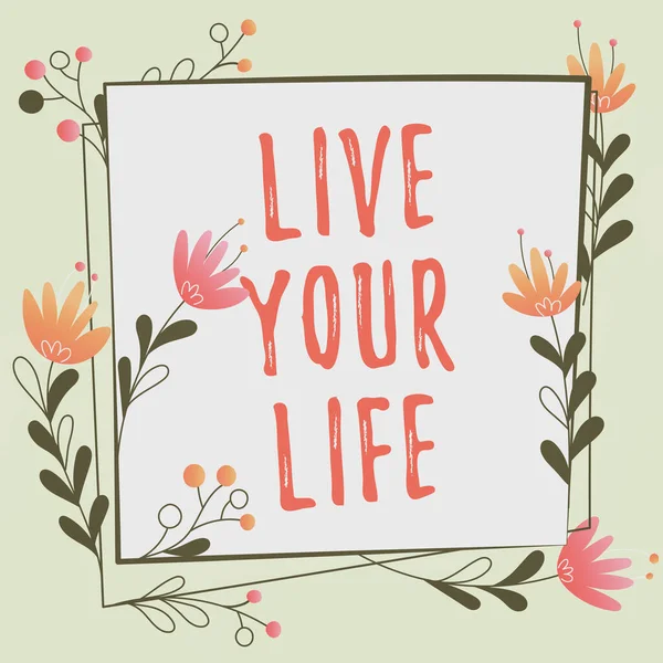 Conceptual display Live Your Life, Business concept Motivation inspiration to follow your dreams accomplish goals Frame Decorated With Colorful Flowers And Foliage Arranged Harmoniously.