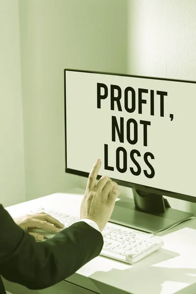 Text caption presenting Profit Not Loss, Word Written on Just revenues good economic strategy successful finances Businessman in suit holding tablet symbolizing successful teamwork.