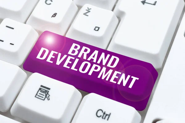 Handwriting text Brand DevelopmentDefining the product to excel in the market Promoting, Concept meaning Defining the product to excel in the market Promoting