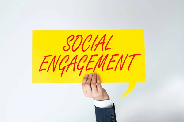 Writing displaying text Social EngagementDegree of engagement in an online community or society, Business idea Degree of engagement in an online community or society