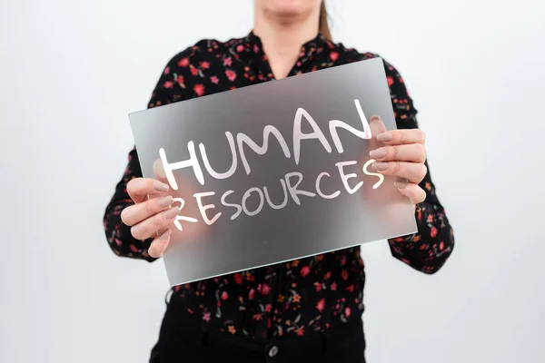 Hand writing sign Human ResourcesThe people who make up the workforce of an organization, Internet Concept The showing who make up the workforce of an organization