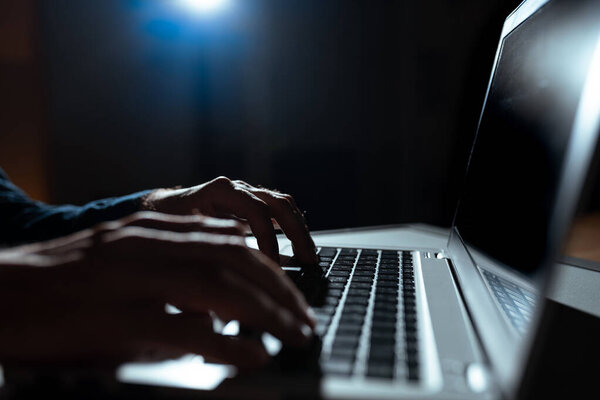 Businesswoman Typing Recent Updates On Lap Top Keyboard On Desk.