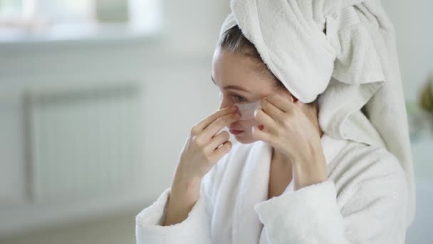Woman Home White Bathrobe Towel Applies Patches Eyes — Video