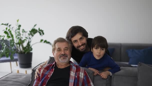 Portrait Happy Caucasian Three Generation Men Smiling Camera Home Front — Αρχείο Βίντεο