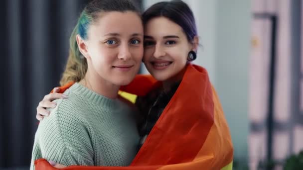 Cheerful Women Wrapped Colorful Rainbow Flag Home — Stok video