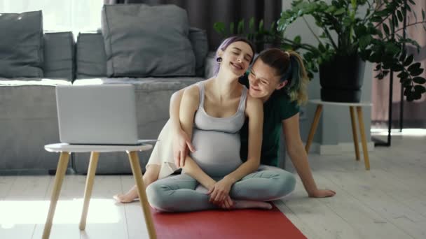 Pregnant Lesbian Couple Hugging Floor Living Room — Wideo stockowe