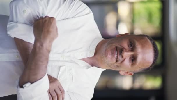 Adult Man Stubble White Shirt Stands Cafe Smiling Posing Camera — Vídeo de stock